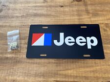 Amc Jeep Vanity License Plate- Amc Logo With Black Background