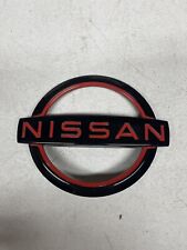 Oem 2021-2022 Nissan Frontier Rear Emblem Badge 90890-9bu1b Black Red